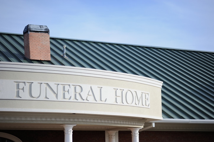 Funeral home sign on building
